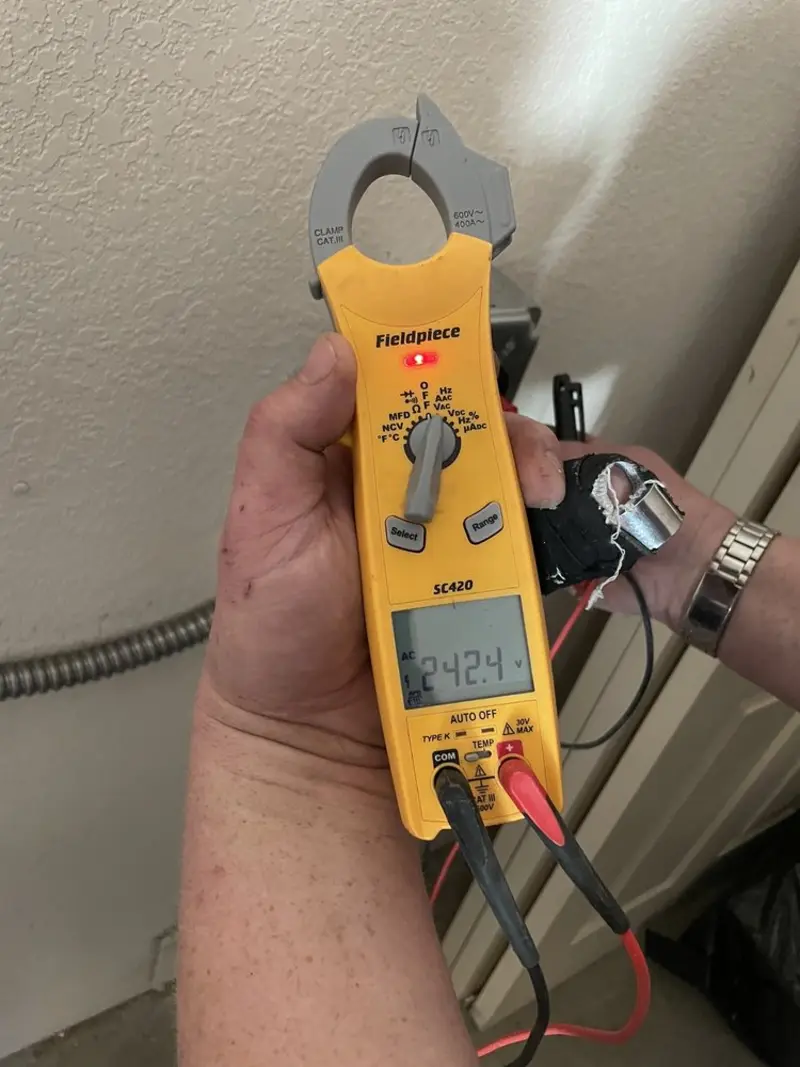 Voltage testing with clamp meter during Generator Installation in Oxford